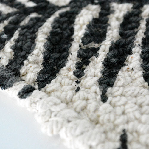 a.depeche roll tufted rug 2117 black LEAF