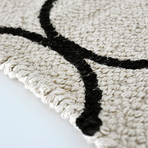 a.depeche roll tufted rug 2117 black MOROCCAN